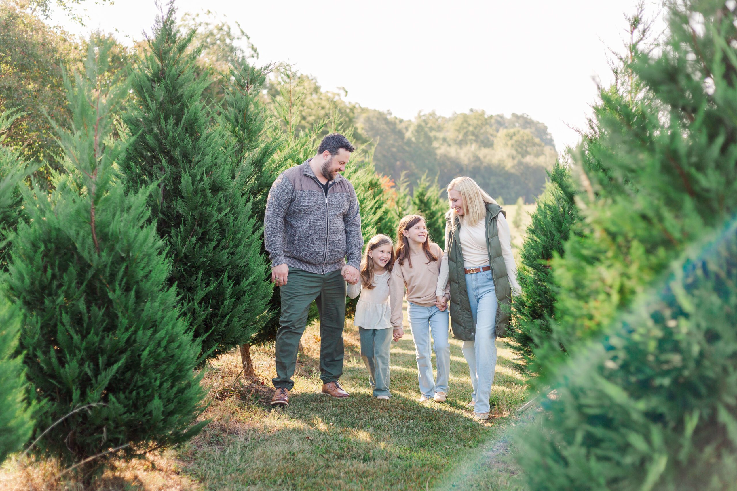 Family standing together during Christmas mini sessions in Greenville SC